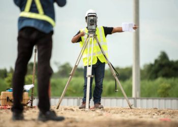 istockphoto-813210666-612×612 survey engineer in construction site use theodolite mark a concrete pile co ordinate